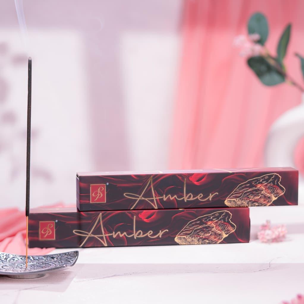 Amber incense sticks burning with warm soothing aroma luxury home fragrance ARWAH